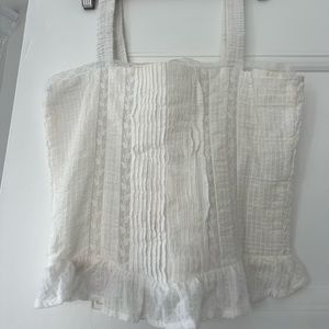 White Revolve tank